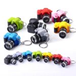 📸 Mini DSLR Camera LED Flashlight Keychain
