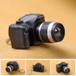 📸 Mini DSLR Camera LED Flashlight Keychain