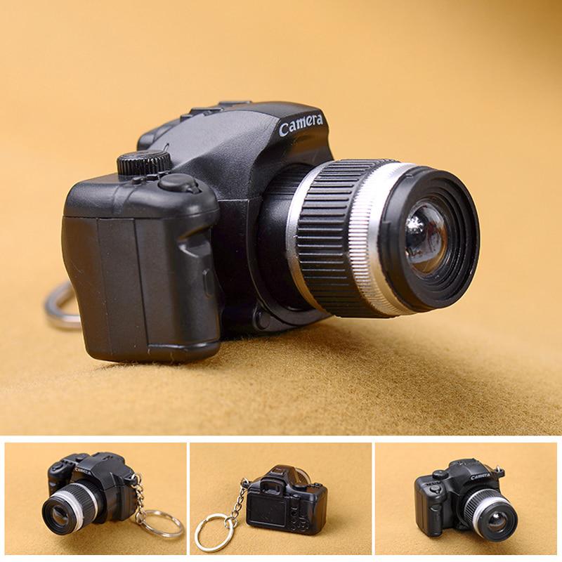 📸 Mini DSLR Camera LED Flashlight Keychain